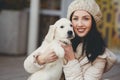 Portrait of the young woman with favourite dogs