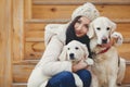 Portrait of the young woman with favourite dogs