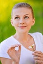 Portrait of young woman with flower Royalty Free Stock Photo