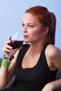 Portrait of young woman with glass red wine Royalty Free Stock Photo