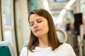 Woman sleeping in modern streetcar Royalty Free Stock Photo