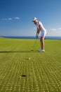 Portrait of young woman golfer Royalty Free Stock Photo