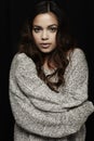 Portrait of young woman in grey sweater Royalty Free Stock Photo