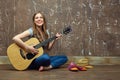 Portrait of young woman with guitar. Royalty Free Stock Photo