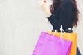 Portrait young woman happy with shopping bags, Beautiful woman with many shopping bags on gray background. Copy space Royalty Free Stock Photo