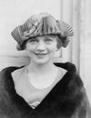 Portrait of young woman in hat and fur coat Royalty Free Stock Photo