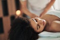Young woman having massage at the spa, relaxing. Royalty Free Stock Photo