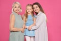 Portrait of young woman, her daughter and mature mother Royalty Free Stock Photo