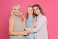 Portrait of young woman, her daughter and mature mother Royalty Free Stock Photo