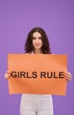 Woman with GirlS Rule poster