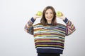 Portrait of a young woman holding two fresh green apples Royalty Free Stock Photo