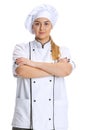 Portrait of young woman, lady-cook, chef in white uniform posing isolated on white background. Cuisine, profession