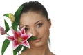 Portrait of young woman with lilly flower Royalty Free Stock Photo