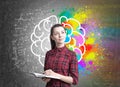 Young woman with a planner, brain, formula Royalty Free Stock Photo