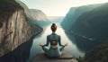 Portrait of a young woman meditating while practising yoga.