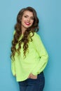 Portrait Of Young Woman In Neon Lime Green Sweater Royalty Free Stock Photo