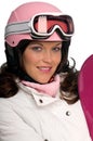 Portrait of young woman with pink helmet