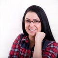 Portrait of young woman in plaid shirt Royalty Free Stock Photo