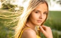 Portrait of young woman with radiant clean outdoor