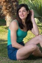 Portrait of young woman relaxing on grass Royalty Free Stock Photo