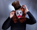 Portriat of a Young woman ins scary clown make up. Royalty Free Stock Photo