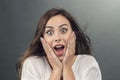 Portrait of young woman with shocked facial expression Royalty Free Stock Photo