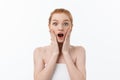 Portrait of young woman with shocked facial expression. Royalty Free Stock Photo