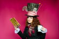 Portrait of young woman in the similitude of the Hatter ( Royalty Free Stock Photo