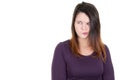 Portrait of a young woman skeptical and thinking aside copy space on white background