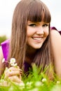 Portrait of young woman with small bouquet Royalty Free Stock Photo