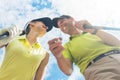 Portrait of a young woman smiling during professional golf game Royalty Free Stock Photo