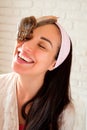 Portrait of young woman with snails on her face Royalty Free Stock Photo