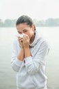 Portrait of a young woman with snuffle or allergy reaction