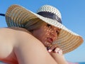 Portrait of young woman in straw hat Royalty Free Stock Photo