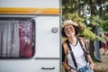 Portrait Of Young Woman At Summer Festival, Standing By Caravan.