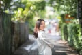 Portrait young woman thinking and looking modern style in outdoor urban background