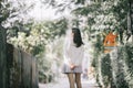 Portrait young woman thinking and looking modern style in outdoor urban background