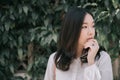 Portrait young woman thinking and looking modern style in outdoor urban background