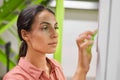 Woman Using Control Panel in Self Storage Unit