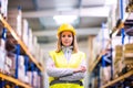 Portrait of a young woman warehouse worker. Royalty Free Stock Photo