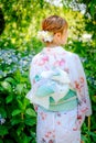 Portrait of a young woman wearing Japanese yukata summer kimono. Kyoto, Japan.