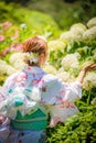 Portrait of a young woman wearing Japanese yukata summer kimono. Kyoto, Japan.