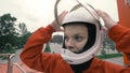 Portrait young woman wearing a protective helmet. Girl in protective helmet