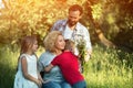 Portrait of young woman in wheelchair hugging her family Royalty Free Stock Photo