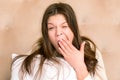 Portrait of young woman yawning Royalty Free Stock Photo
