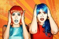 Portrait of young women in comic pop art make-up style. Shocked females in red and blue wigs