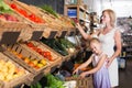 Portrait of young woman and girl gladly shopping Royalty Free Stock Photo