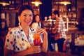 Portrait of young woman having cocktail drink Royalty Free Stock Photo