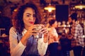 Portrait of young woman having a cocktail drink Royalty Free Stock Photo
