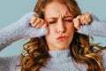 portrait of a young worried woman with a headache Royalty Free Stock Photo